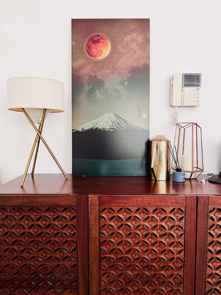 An Indonesian wood console from West Elm with Mount Fuji art work