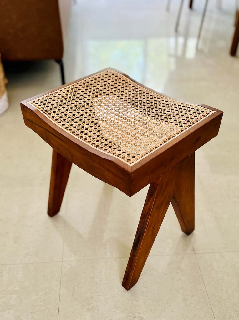 An Asian design rattan and wood stool